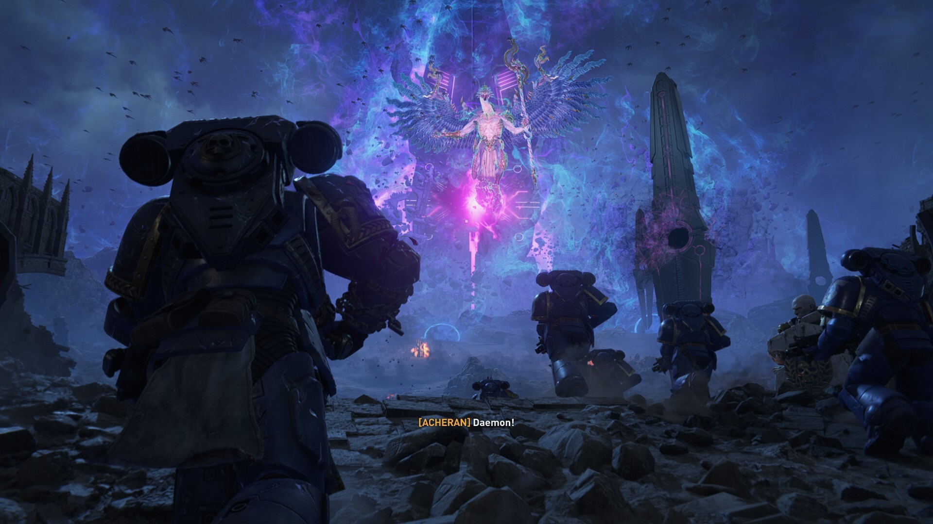 A gigantic, bird-like bipedal demon with a staff is floating in front of a massive glowing obelisk. Space marines are on the ground, charging towards it.