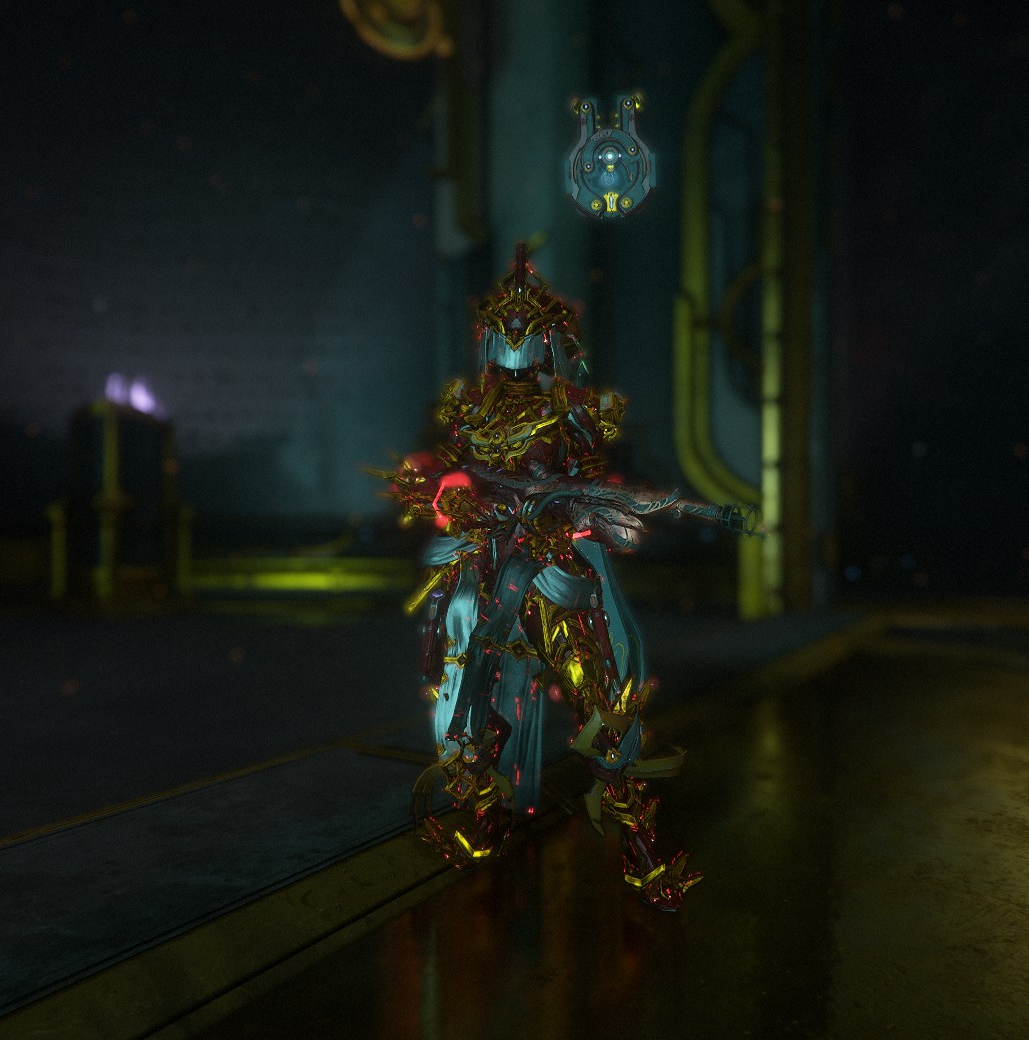 Khora prime, a robotic humanoid with lots of sharp angles. The humanoid looks vaguely female. The helmet has a white veil over where the eyes would be. The robot is red with gold trim, has several white strips of cloth attached to its arms, and holds a flamethrower across its chest sporting the same colours. 